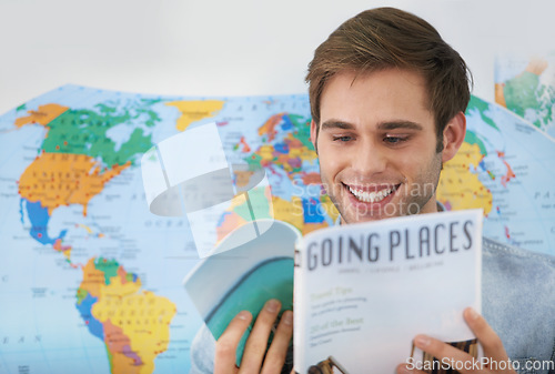 Image of Travel agent, office and happy man reading brochure information, tourism book or planning global trip. Business magazine, professional agency employee and male person review holiday destination route