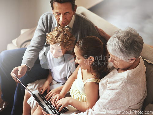 Image of Grandparents, laptop or fun kids learning how to type or playing online game in family home together. Education, child development or children siblings on computer with grandmother or grandfather