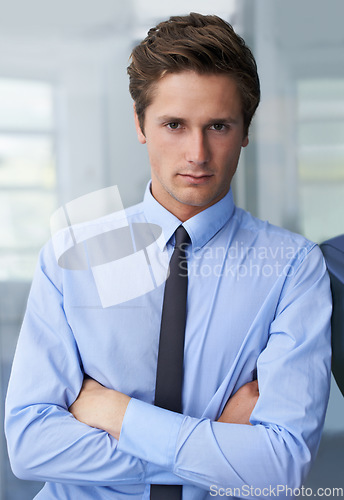 Image of Crossed arms, serious and portrait of business man, professional consultant or agent with focus on corporate work. Mindset, confident person and businessman, accountant or employee with career pride