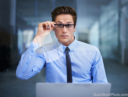 Image of Office, glasses and portrait of business man ready for online laptop research, ecommerce or working on financial banking analysis. Bank company, eyeglasses lens and person focus on finance accounting