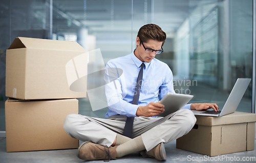 Image of Tablet, office laptop and man with moving boxes, business data and reading report, statistics analysis or online news. Workplace relocation, cardboard box and male businessman typing research project