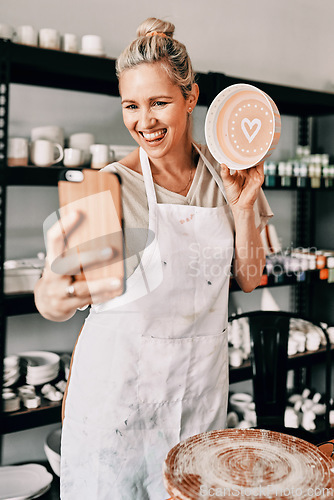 Image of Happy woman, pottery and smile in small business selfie for social media, advertising or vlog at store. Female person or retail owner smiling with clay bowl for photo or online post on smartphone