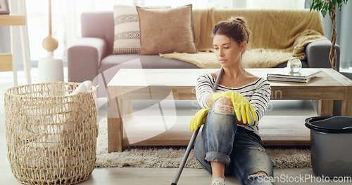 Image of Tired, home and woman relax, cleaning and chores with gloves, apartment or exhausted in the lounge. Female person, lady or cleaner in the living room, housekeeping and stress with burnout and fatigue