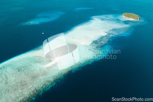 Image of Top view, blue ocean and island with shallow water for travel, journey or adventure at sea on mockup. Big beach view of calm, peaceful or serene tropical waters above and natural scenic environment