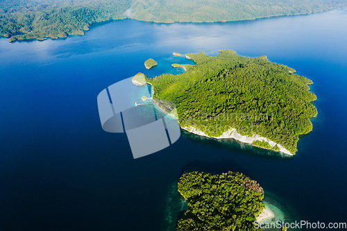 Image of Drone view, island and nature for freedom, travel and explore, travel and trip with zen. Tropical, water and location for tourism, peace and beautiful scenery, earth and summer in Fiji from above