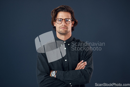 Image of Portrait, serious and business man with arms crossed isolated on office wall background mockup space. Glasses, entrepreneur and confident face of male accountant from Australia with pride for career.