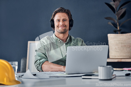 Image of Laptop, headphones and portrait of architect man in office streaming radio podcast. Face, music and male engineer listening to audio, sound or happy song, web browsing or social media on pc mockup.