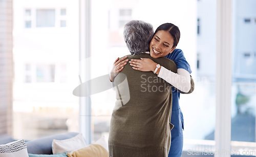 Image of Hug, nurse and senior woman with a smile, service and healthcare with cure, happiness and help. Female person, medical professional or employee with a patient, embrace and care with support and happy