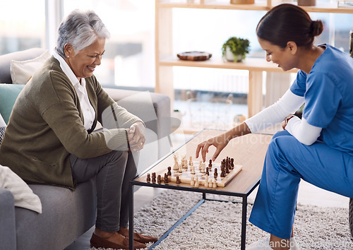 Image of Women, chess and nurse with a senior patient, retirement home and happiness with healthcare. Female person, medical professional and mature lady with employee, nursing and care with games and relax