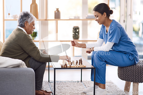 Image of Caregiver, chess or old woman in nursing home for healthcare, problem solving skills or mental health recovery. Relaxing, nurse or focused mature patient thinking of solution or playing board games