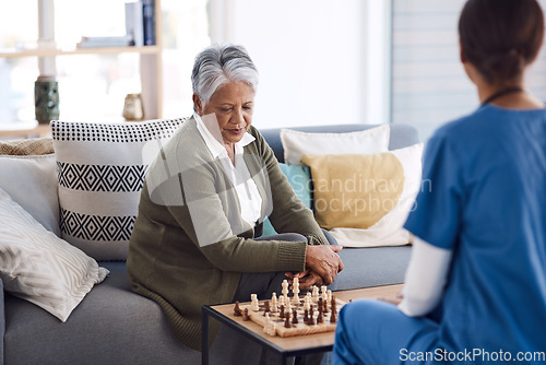 Image of Nurse, chess or old woman in nursing home for healthcare, problem solving skills or mental health recovery. Relaxing, caregiver or focused mature patient thinking of solution or playing board games