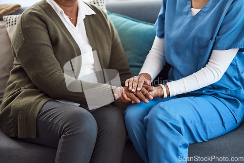 Image of Counseling, woman or nurse holding hands for support or empathy for healthcare service of cancer therapy. Closeup, psychology help or sick patient in consulting with a caregiver in consultation