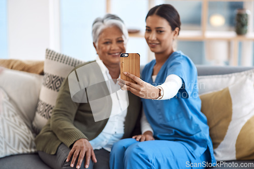 Image of Caregiver, phone selfie or old woman in nursing home with smile or happiness for profile pictures or retirement. Women, mobile photography or happy nurse smiling with elderly patient for wellness