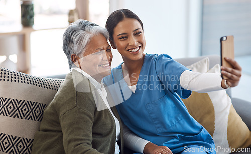 Image of Nurse, selfie or happy old woman in nursing home with smile or happiness for profile pictures or retirement. Women, photography or caregiver relaxing or smiling with elderly patient for social media