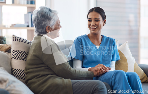 Image of Healthcare, support and a nurse talking to an old woman in a nursing home during a visit or checkup. Medical, empathy and a female medicine professional having a conversation with a senior resident