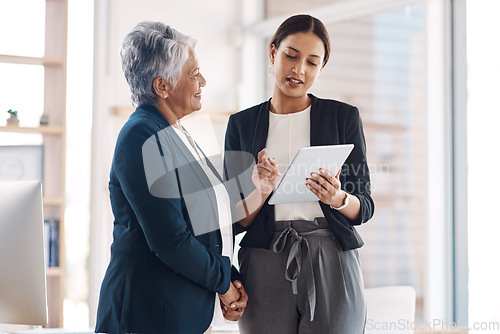 Image of Mentor, teamwork and business women with tablet for talking, cooperation and planning. Technology, collaboration and happy senior manager with female intern for strategy, office training or coaching.