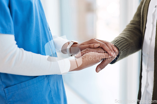 Image of Support, holding hands and nurse with elderly woman for empathy, comforting and compassion. Healthcare, retirement care and female health worker with senior patient for help, diagnosis and wellness