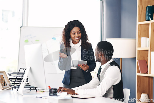 Image of Telemarketing , black people talking and with computer at desk in their office at work with technology. Teamwork or collaboration, internship or communication and African coworkers discussing