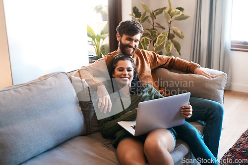 Image of Relax, love and laptop with couple on sofa for happy, social media and streaming. Smile, internet and subscription with man and woman online in living room at home for network, news and website
