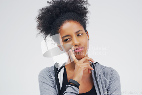 Image of Serious, black woman and isolated thinking of fitness, workout doubt or planning exercise and health goals. Girl, think or plan decision for training, gym or remember sport ideas on white background