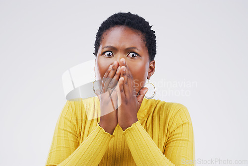 Image of Shock, fear and scared woman in a studio with a omg, wow or wtf facial expression for emoji. Emotion, afraid and African female model with a surprise face with hands on her mouth by white background.