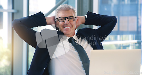 Image of Portrait, relax and business man, ceo or professional in office working on laptop. Face, glasses and male executive on break, senior entrepreneur or happy director from Canada with pride for career.