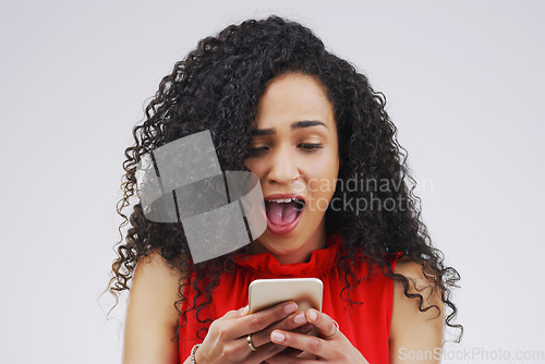 Image of Wow, social media and a woman with a phone for a chat isolated on a white background in a studio. Surprise, fake news and young girl with a mobile for communication, conversation app and connectivity