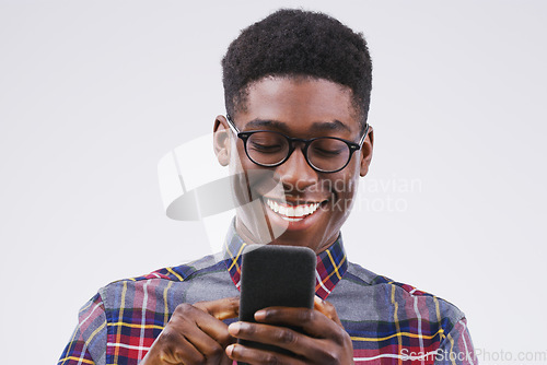 Image of Phone, happy and face of black man in studio with smile for social media, internet and online chat. Communication, white background and male person on smartphone for website, mobile app and texting