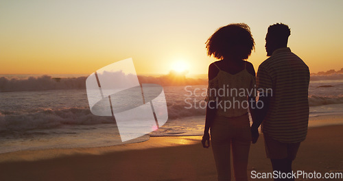 Image of Man with woman holding hands, beach at sunset and sea with back view, mockup space and travel with couple outdoor. Love, romance and trust with people in commitment, tropical holiday and ocean waves