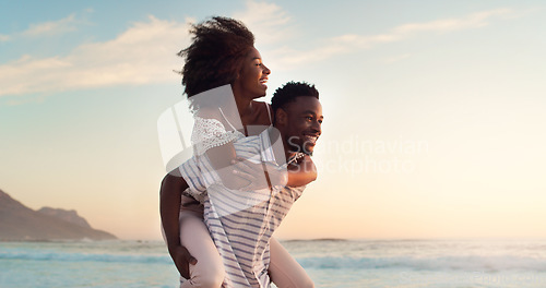 Image of Black couple, piggyback on beach and travel with hug, love and freedom outdoor, sea view and mockup space. Nature, adventure and vacation, man and woman bonding, happiness and trust in relationship