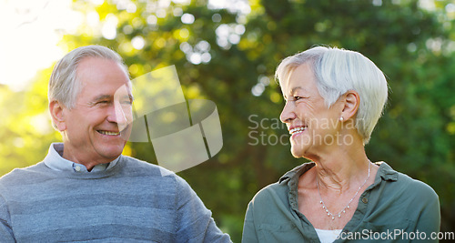 Image of Senior couple, happy and love outdoor at a park with a smile, care and support for health and wellness. A elderly man and woman in nature for a walk, quality time and healthy marriage or retirement