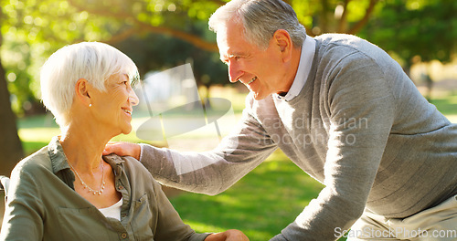 Image of Senior couple, happy and talking outdoor at a park with love, care and support. A elderly man and woman in nature for communication, quality time and healthy marriage or retirement with understanding