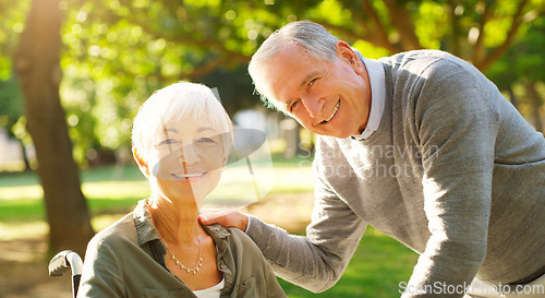 Image of Senior couple, wheelchair and portrait outdoor at a park with love, care and support for health and wellness. Face of elderly man and woman in nature for quality time, healthy marriage and retirement