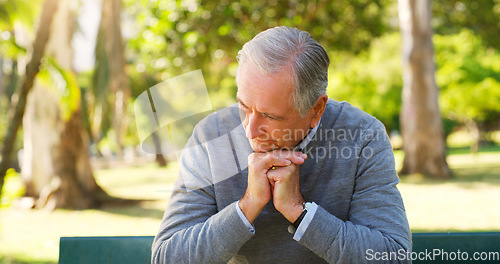 Image of Depression, thinking and senior man in garden sitting on bench for fresh air in nature. Contemplating, outdoor and worried elderly male person in retirement in park with thoughtful face expression.