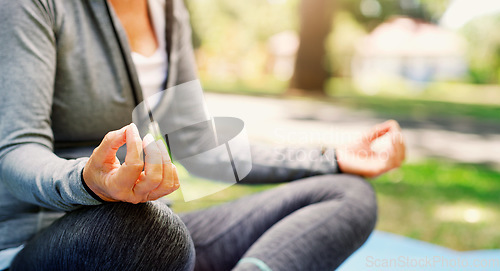 Image of Woman outdoor, yoga and meditation with lotus pose, fitness in park with zen and spiritual healing. Female person hand, exercise in nature and meditate for health with wellness and mindfulness