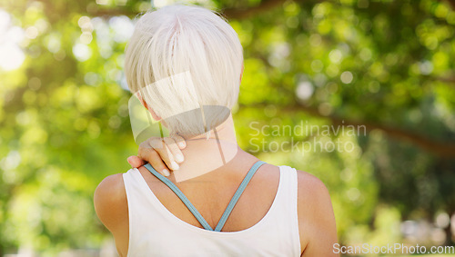 Image of Back view of senior woman, neck pain and injury outdoor, fibromyalgia health problem and joint ache from exercise. Female pensioner with arthritis, retirement with fitness in park and mockup space