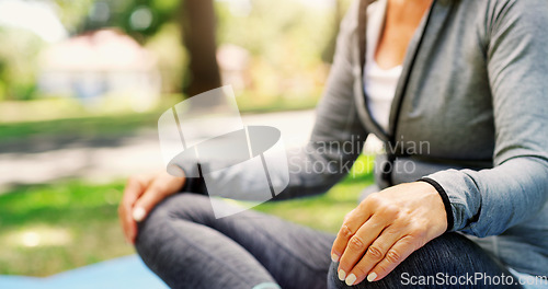 Image of Woman in park, yoga and meditation with fitness outdoor, zen and calm with spiritual healing in park. Female person exercise in nature, pilates and meditate for health, wellness and mindfulness