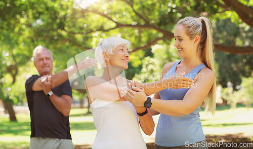 Image of Yoga, workout and an old couple with their personal trainer in a park for a health or active lifestyle. Exercise, wellness or zen and senior people outdoor for fitness class with their pilates coach