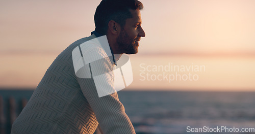 Image of Profile, sunset and thinking man by beach on vacation or holiday mockup space. Ocean, side view and happy male person relax outdoor by sea for travel, freedom and enjoying summer peace with a smile.