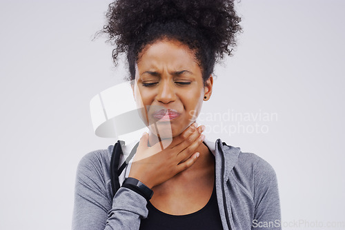 Image of Black woman, sore throat and virus from cough, allergies or bacteria against a white studio background. Sick African female person touching neck in pain, allergy or flu of cold, illness or infection