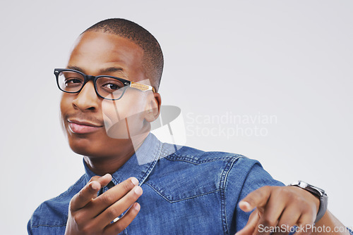 Image of Portrait, smile and black man pointing to you, motivation and confident guy against a white studio background. Face, male person or happy model with hand gesture, decision and choice with opportunity