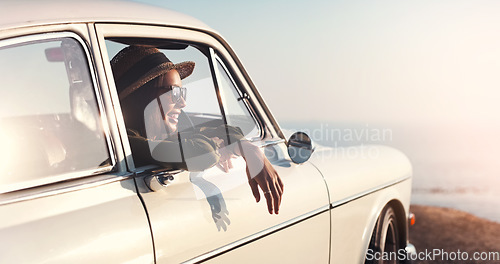 Image of Road trip, window and view with a woman in a car for travel, freedom or a joyride as a tourist on the coast. Nature, sunset and relax with a young female traveler taking a drive outdoor for adventure