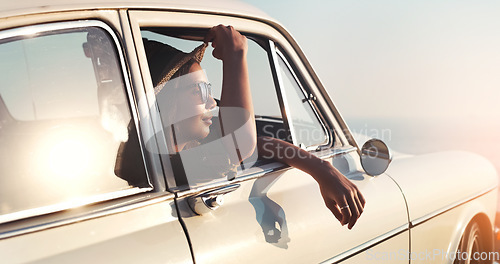 Image of Road trip, window and flare with a woman in a car for travel, freedom or ride as a tourist on a coast in summer. Nature, sunset or vacation with a female traveler taking a drive outdoor for adventure