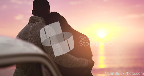 Image of Couple, hug and sky or sunset at beach on vacation, holiday or adventure. Back of man and woman together for love, road trip and travel journey or date outdoor in nature with mockup space and freedom