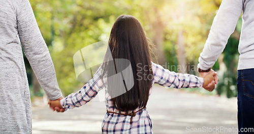 Image of Back, garden and a girl holding hands with her grandparents while walking together in a park during summer. Nature, family or children and a female kid, grandmother and grandfather bonding outdoor