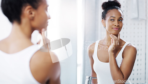 Image of Glow, mirror and beauty with woman in bathroom for skincare, cleaning and shower. Self care, morning and face with reflection of female person at home for wellness, hygiene routine and grooming
