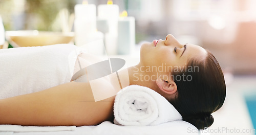 Image of Woman, relax and sleeping on massage bed at spa for zen, physical therapy or healthy wellness at resort. Calm female person relaxing in peaceful sleep for luxury body treatment or self love at salon