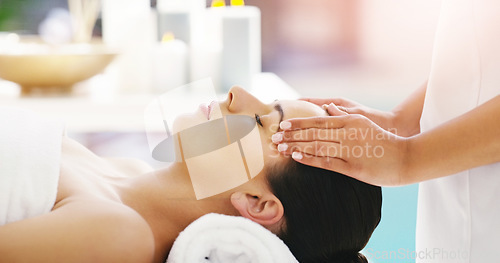 Image of Woman, hands and relax in face massage at spa for zen, physical therapy or healthy wellness at resort. Calm female person relaxing or sleeping in luxury facial treatment or stress relief at salon