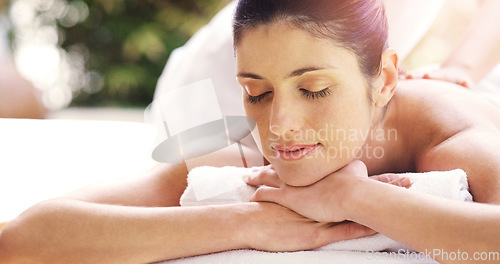 Image of Woman, relax and back massage at spa sleeping for healthy wellness, skincare or stress relief at the resort. Calm female person relaxing in peaceful zen, reiki or luxury body treatment at the salon