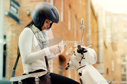 Image of Motorcycle, woman and phone with navigation search in a city with helmet on a street. Motorbike, mobile connectivity and female person with map on urban road with journey and travel on bike